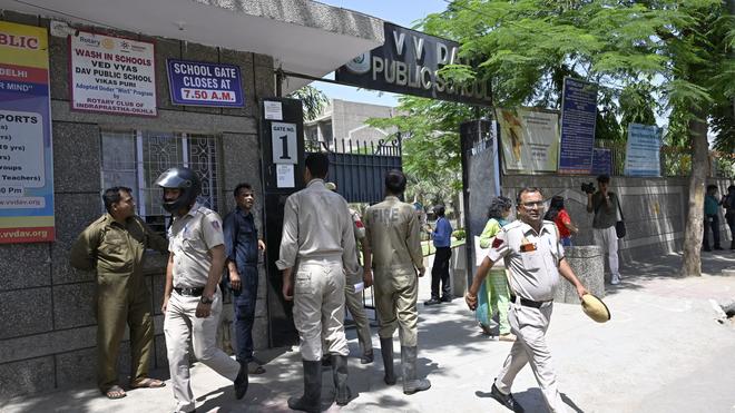 Delhi police during the search operations with the assistance of bomb detection teams, at Veda Vyasa Fav Public School in Vikas Puri, west Delhi