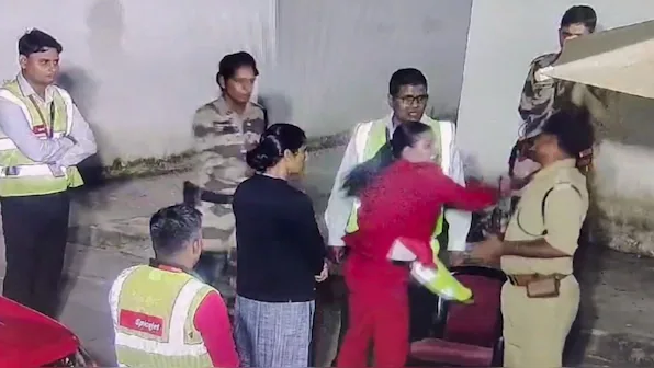 A grab from a CCTV footage shows a SpiceJet staff member slapping a Central Industrial Security Force (CISF) jawan during an argument over security screening, at Jaipur Airport, Thursday, July 11, 2024. PTI