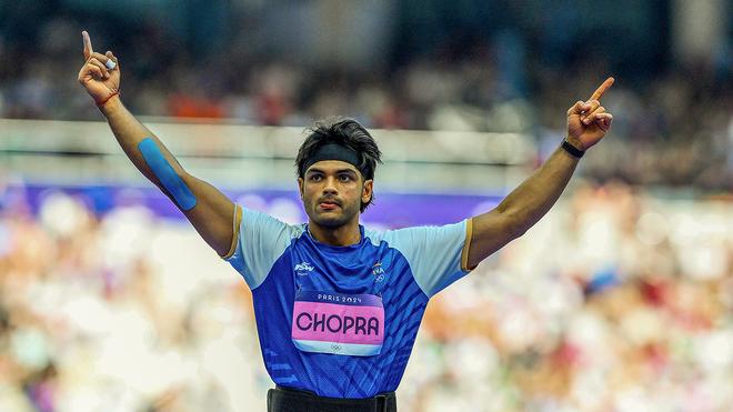 Neeraj Chopra reacts after he qualifies in men’s Javelin throw final.